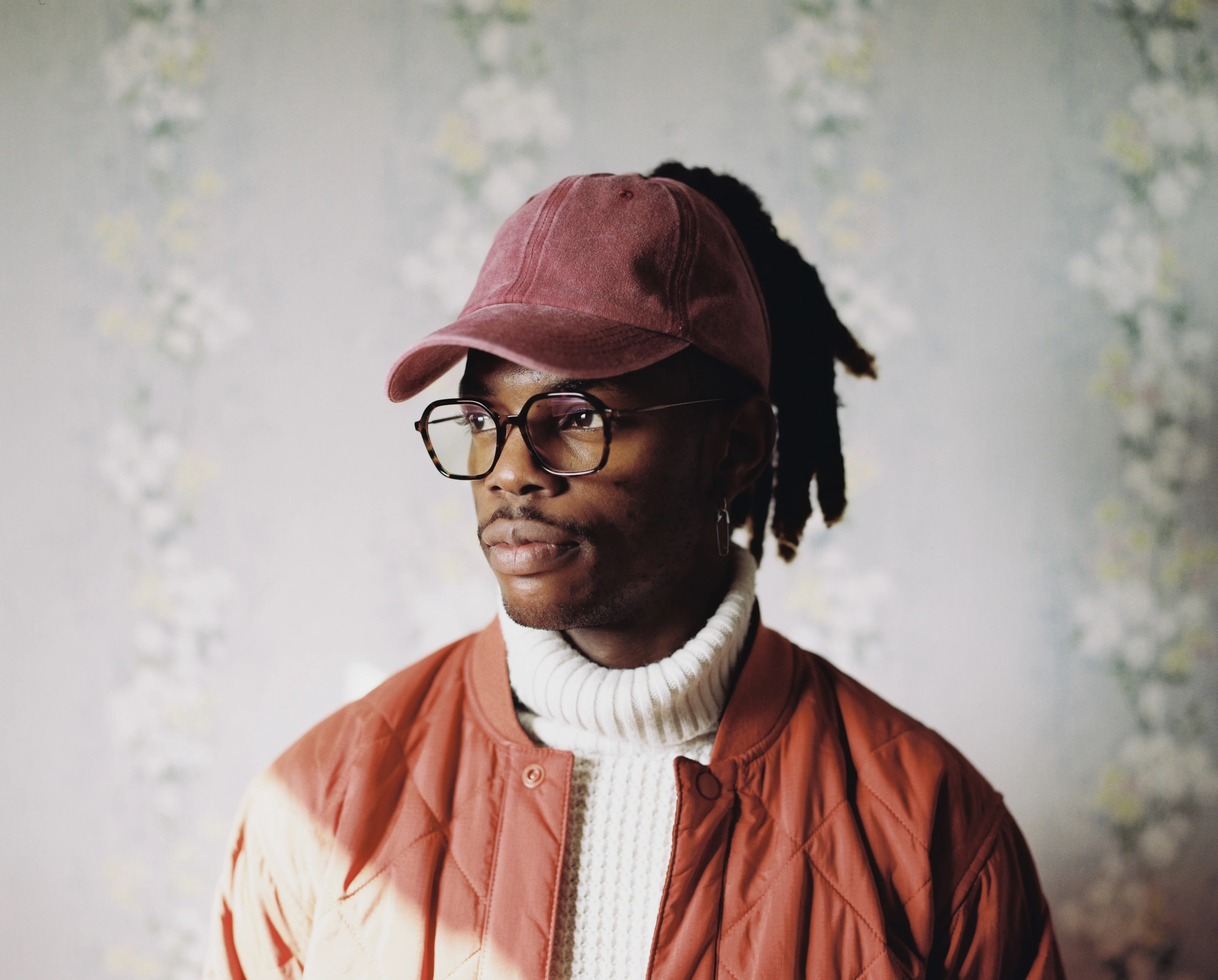 Portrait of Sola Kabuta, Creative Front-End Developer and Visual Designer